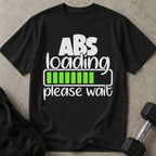 Model wearing the Abs Loading funny gym t-shirt by Lift Society