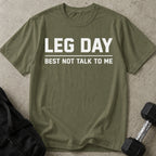Model wearing the Leg Day funny gym t-shirt by Lift Society